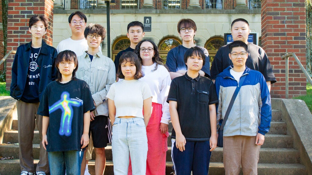 A group of students from the M.S. in Biostatistics program pose on the Med-Dent Steps during Fall 2024.