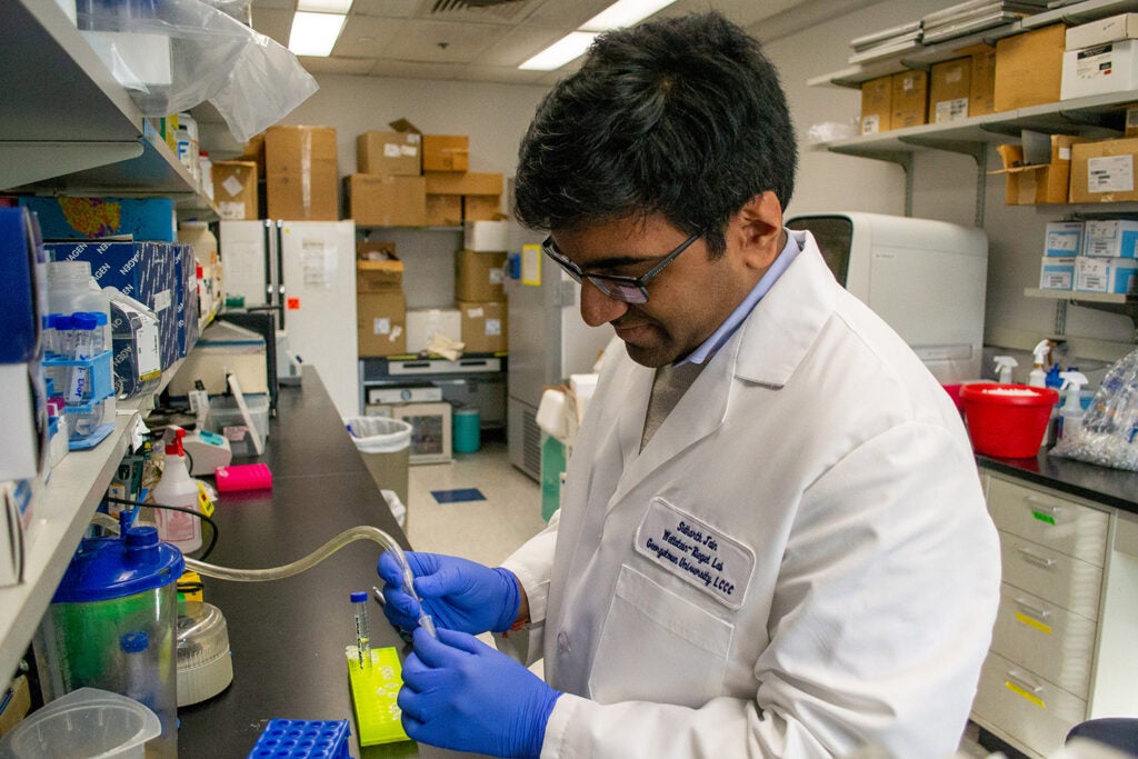 Tumor Biology M.D./Ph.D. student Sidharth Jain works in the Wellstein-Riegel Lab