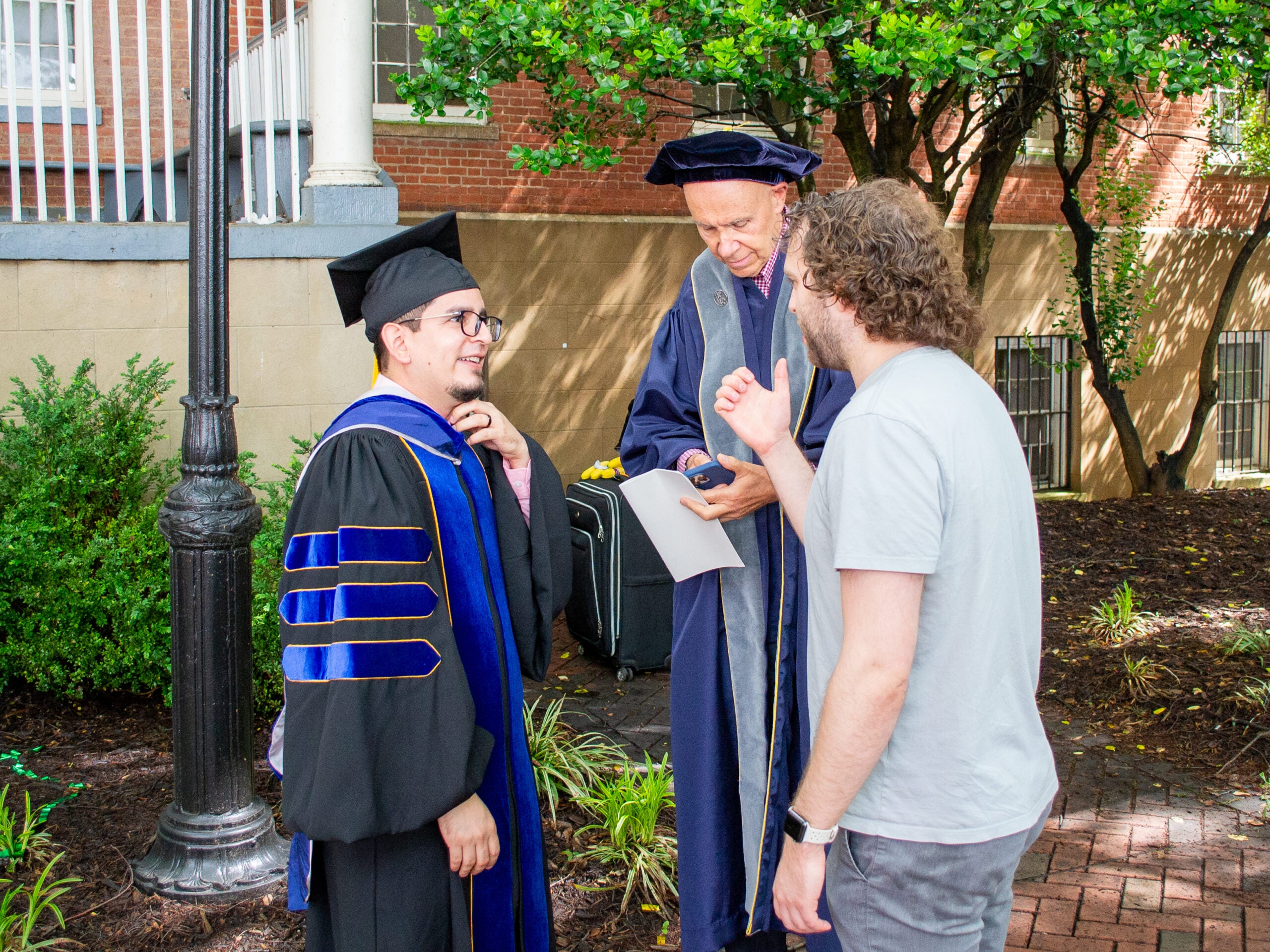 Ph.D. graduate at the Doctoral Hooding Reception