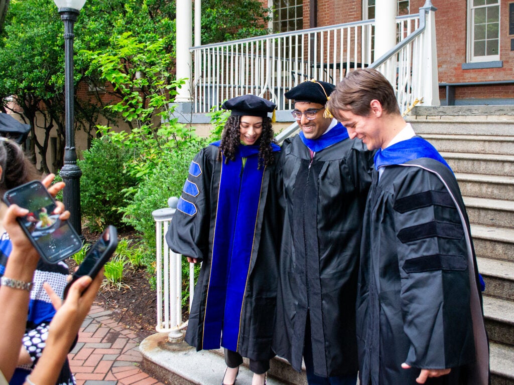 Ph.D. graduates at the Doctoral Hooding Reception