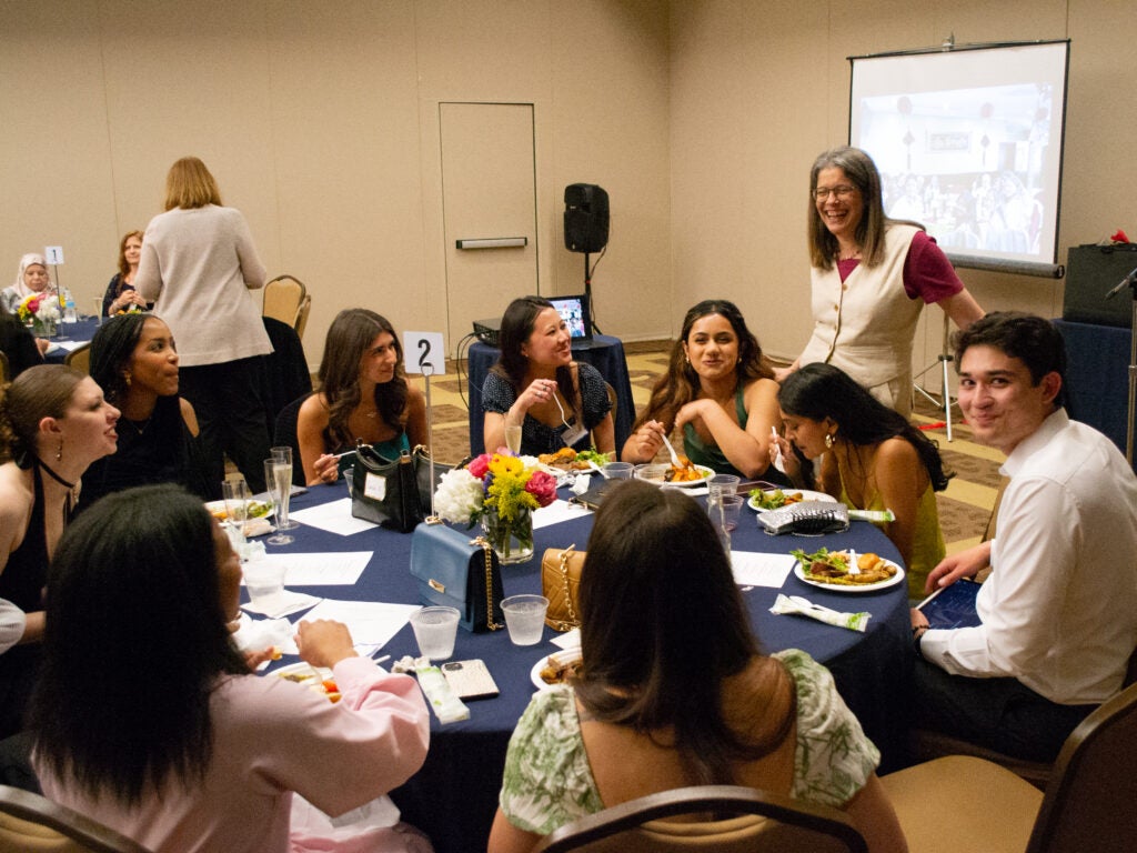 Dr. Amri and students at the Integrative Medicine & Health Sciences program gala