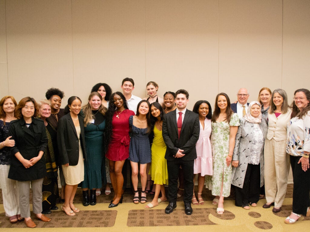 Students and faculty group photo at the Integrative Medicine & Health Sciences program gala