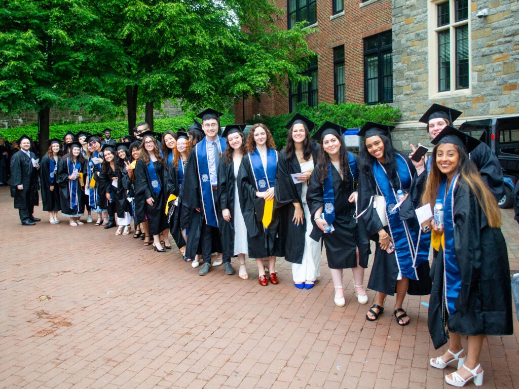 Graduates at Commencement line-up