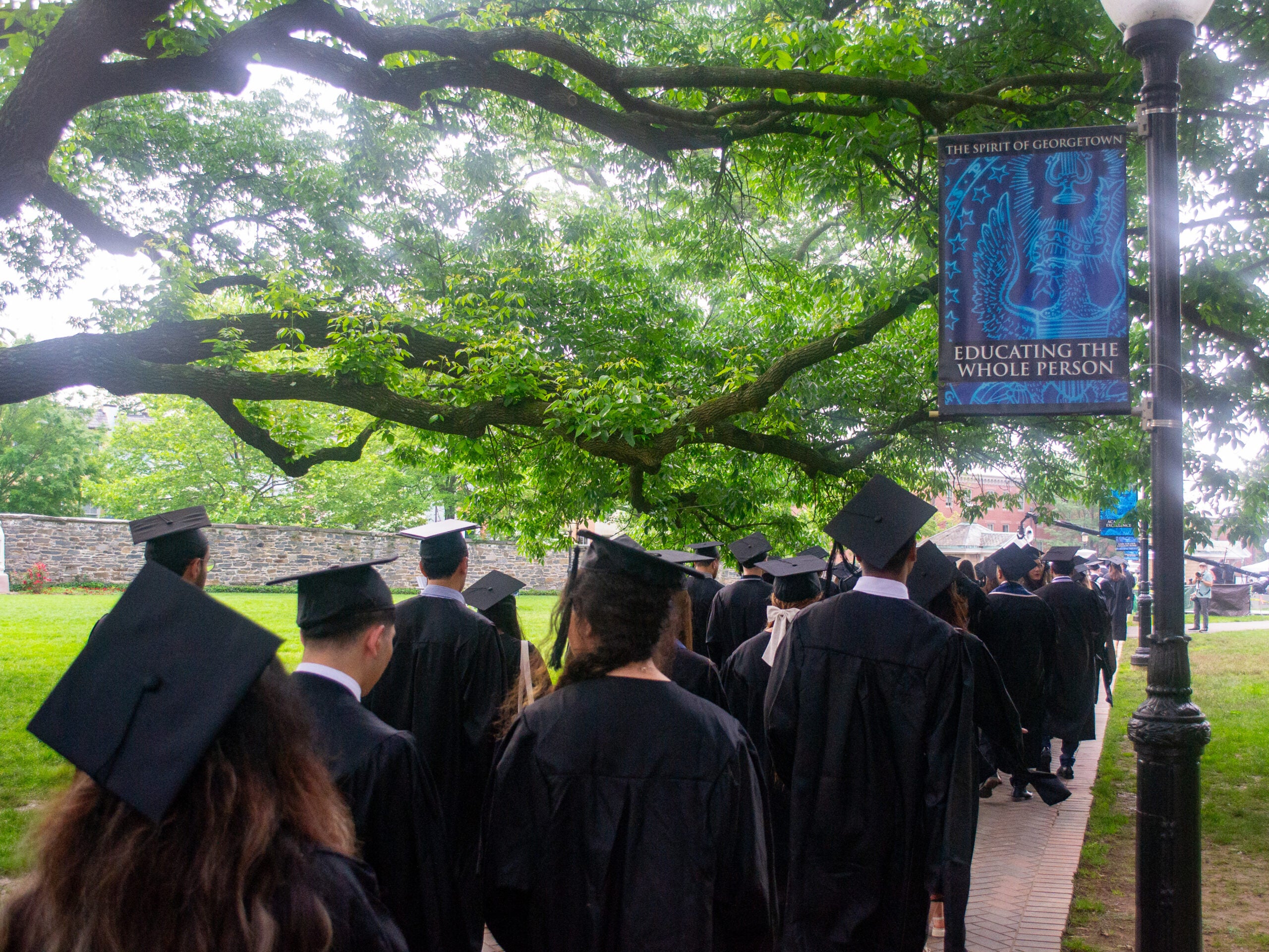 Graduates at Commencement line-up