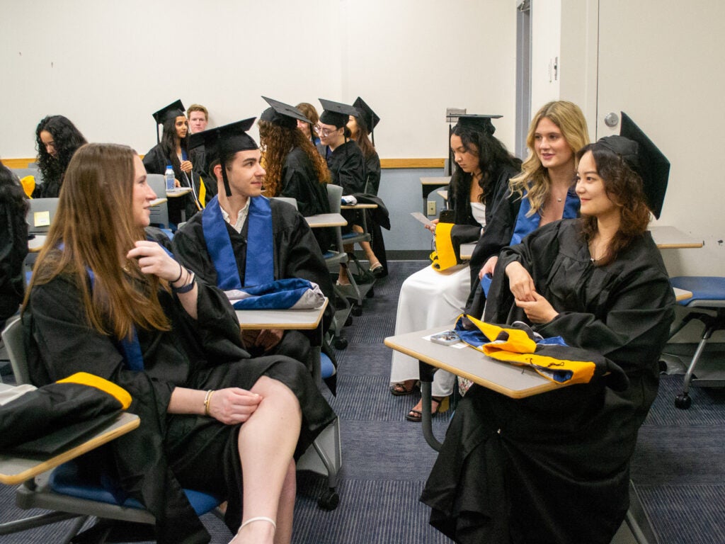 Graduates at Commencement line-up