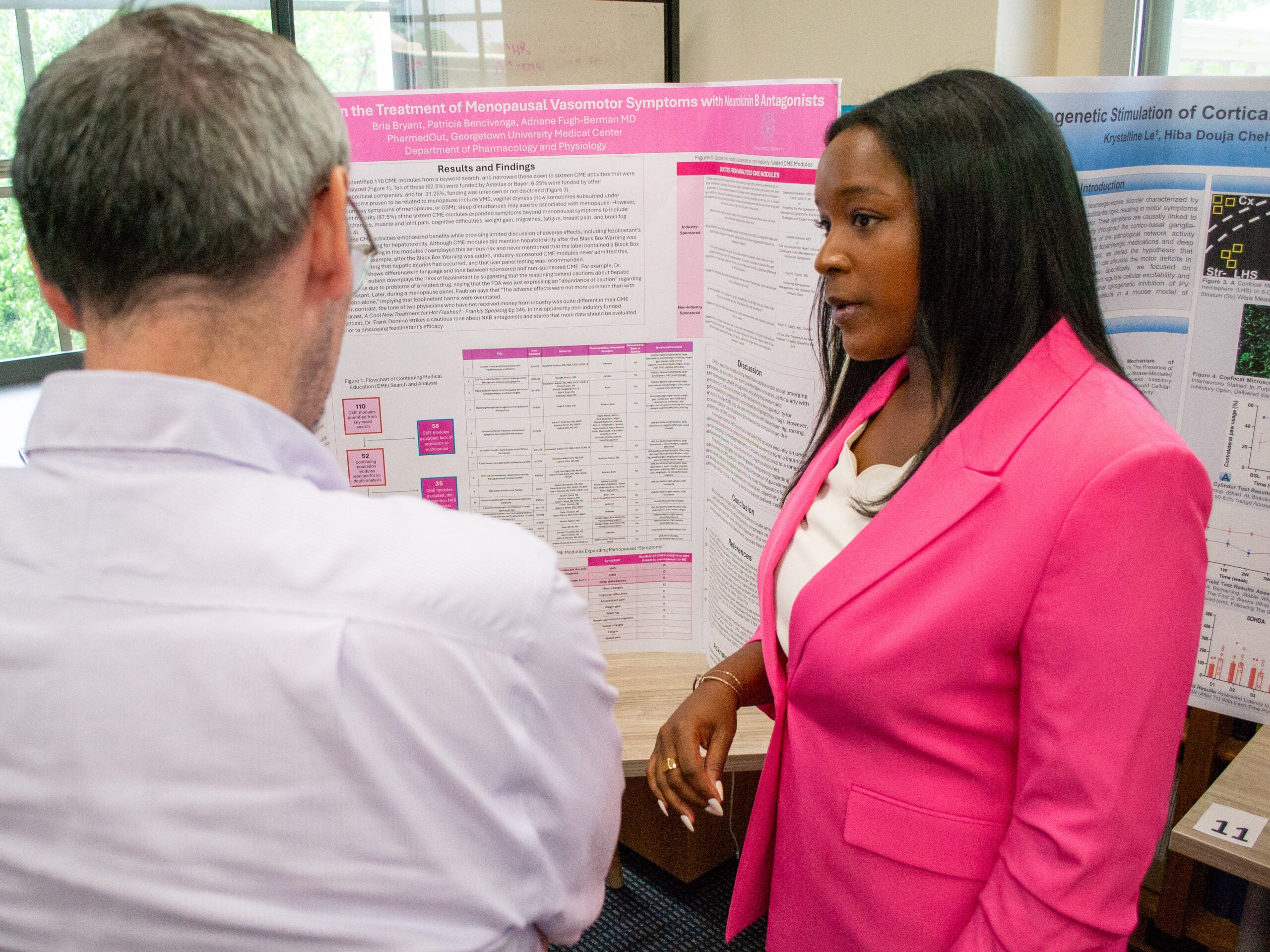A student presents her research at the Pharmacology and Physiology poster session
