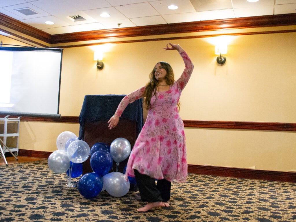 A student dances at the Systems Medicine program gala