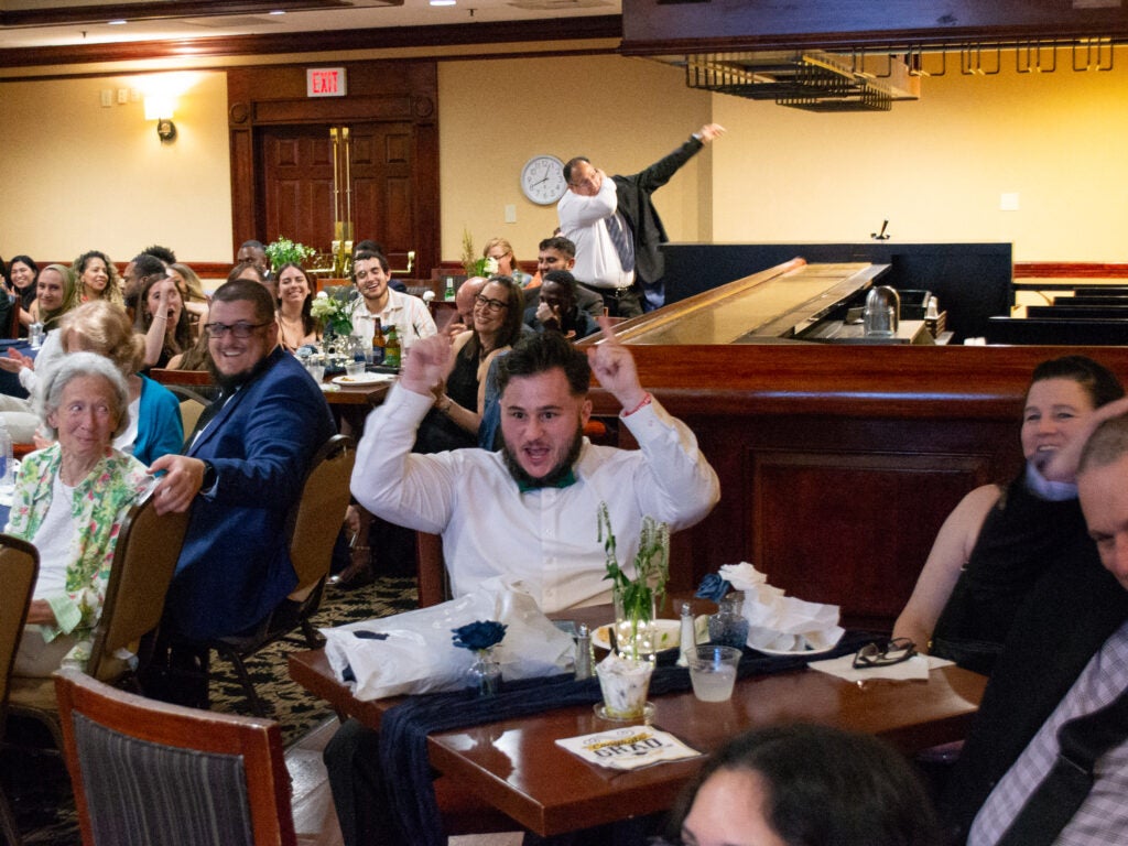 A student celebrates at the Systems Medicine program gala