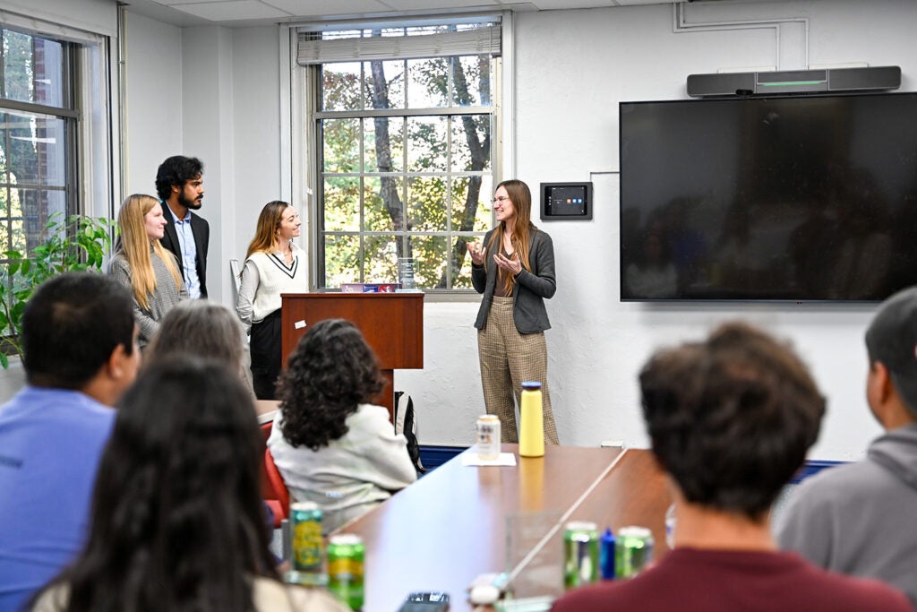 Assistant Professor Rebekah Evans speaks after receiving the IPN Faculty Magis Award at the inaugural IPN Student Awards