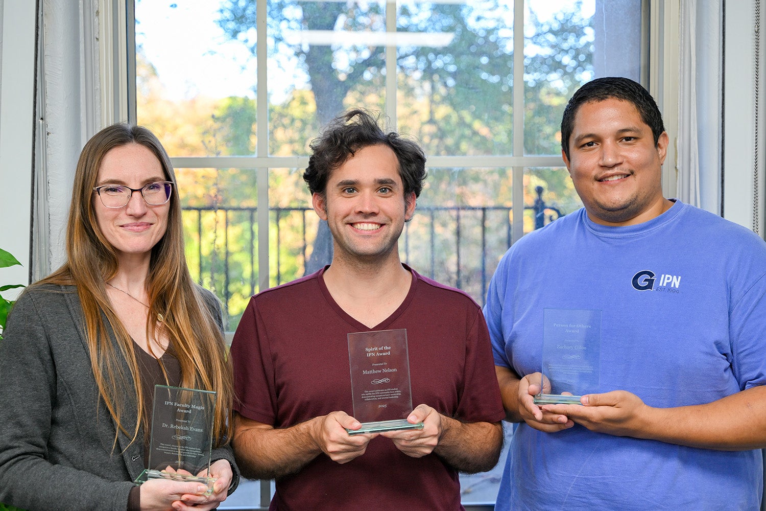 Winners of the inaugural IPN Student Awards, from left: Rebekah Evans (IPN Faculty Magis Award), Matthew Nelson (Spirit of the IPN Award) and Zachary Colon (IPN Student Person for Others Award)