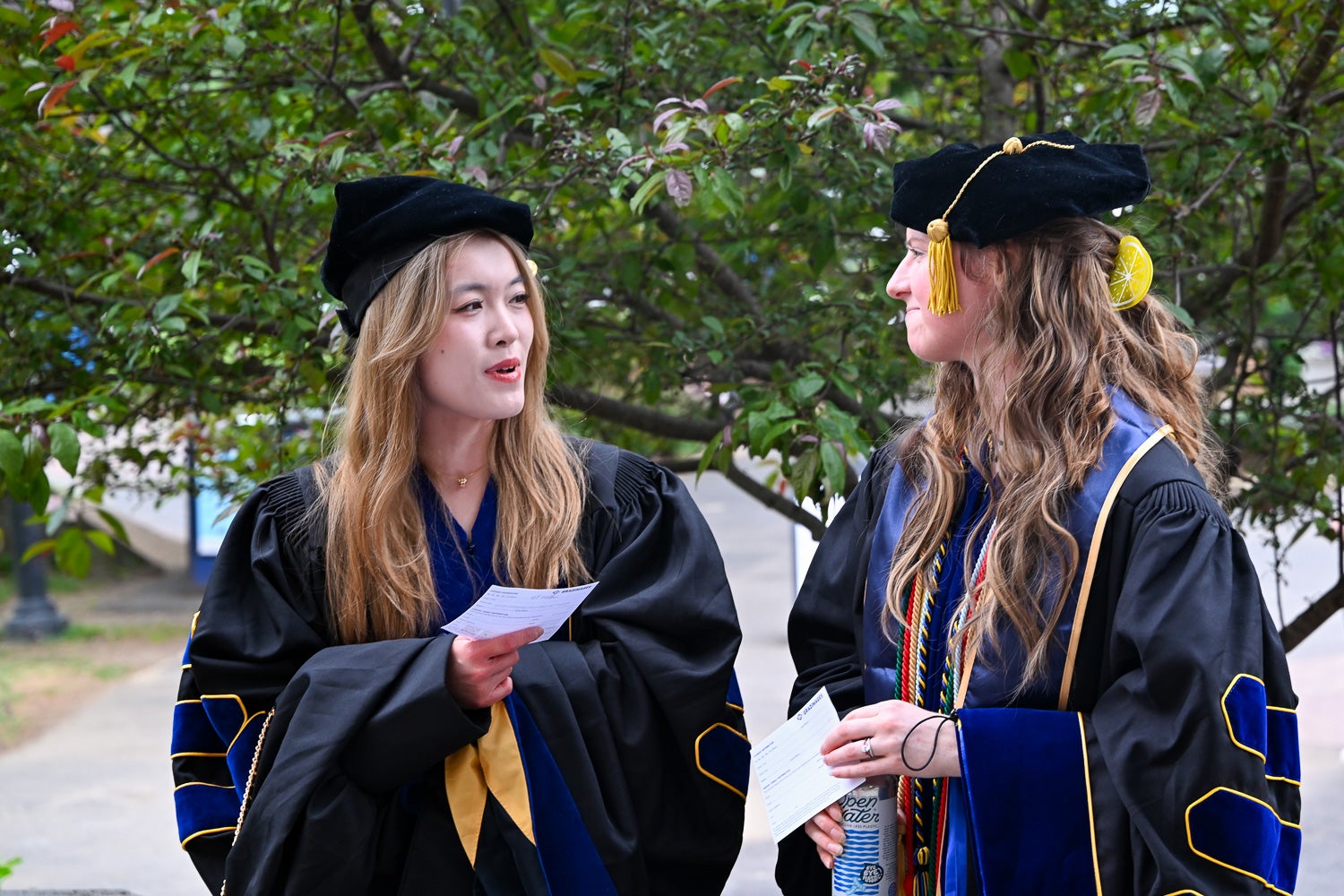 BGE Ph.D. graduates on White-Gravenor Esplanade before the School of Medicine Commencement ceremony