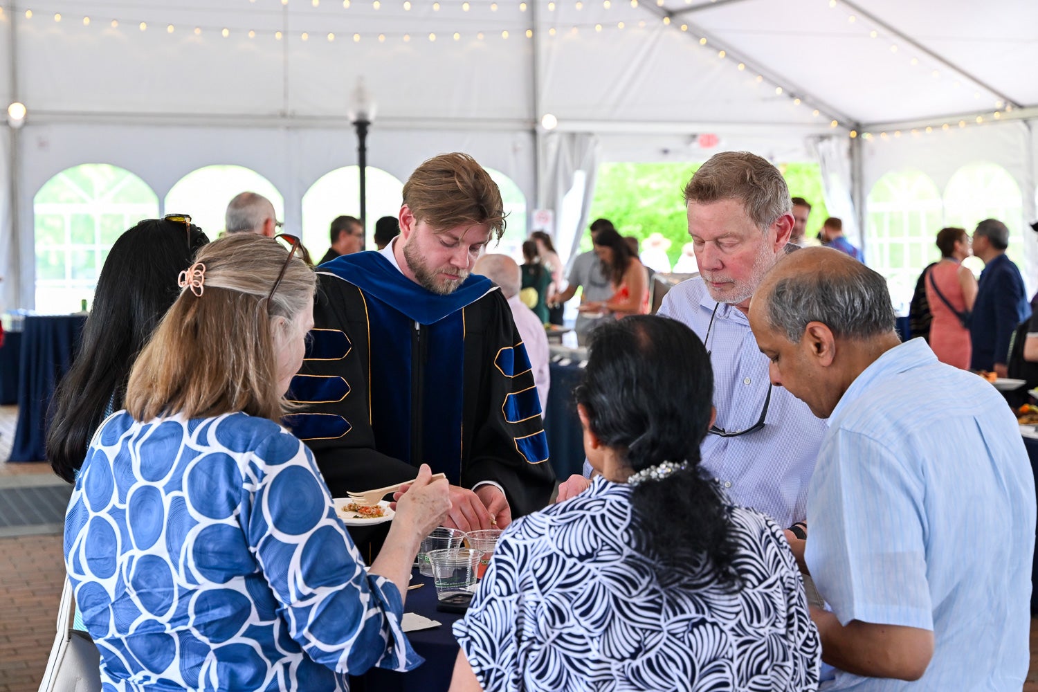 Attendees eat at the BGE Ph.D. Reception