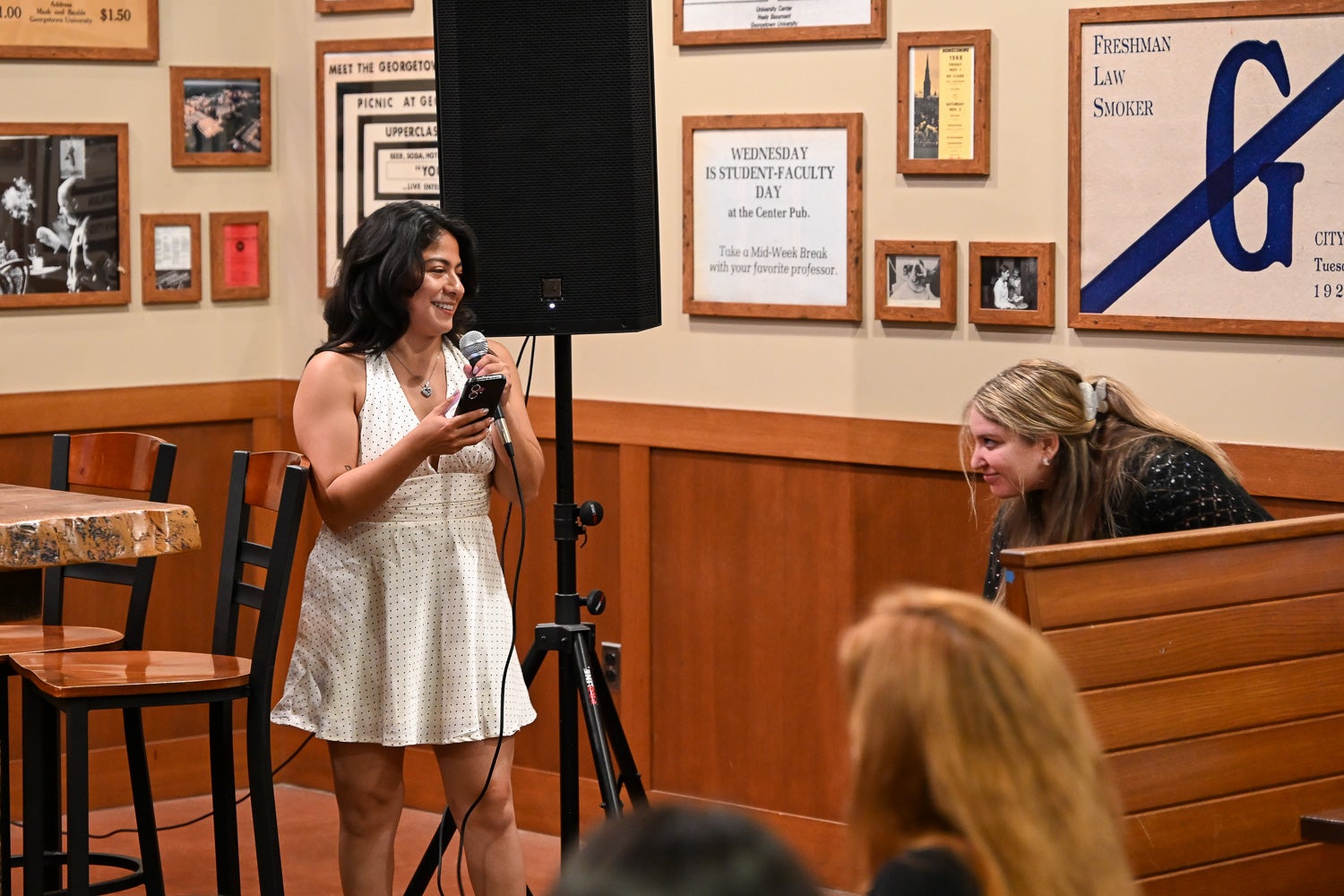 A student speaks at the Integrative Medicine & Health Sciences Pre-Commencement Dinner