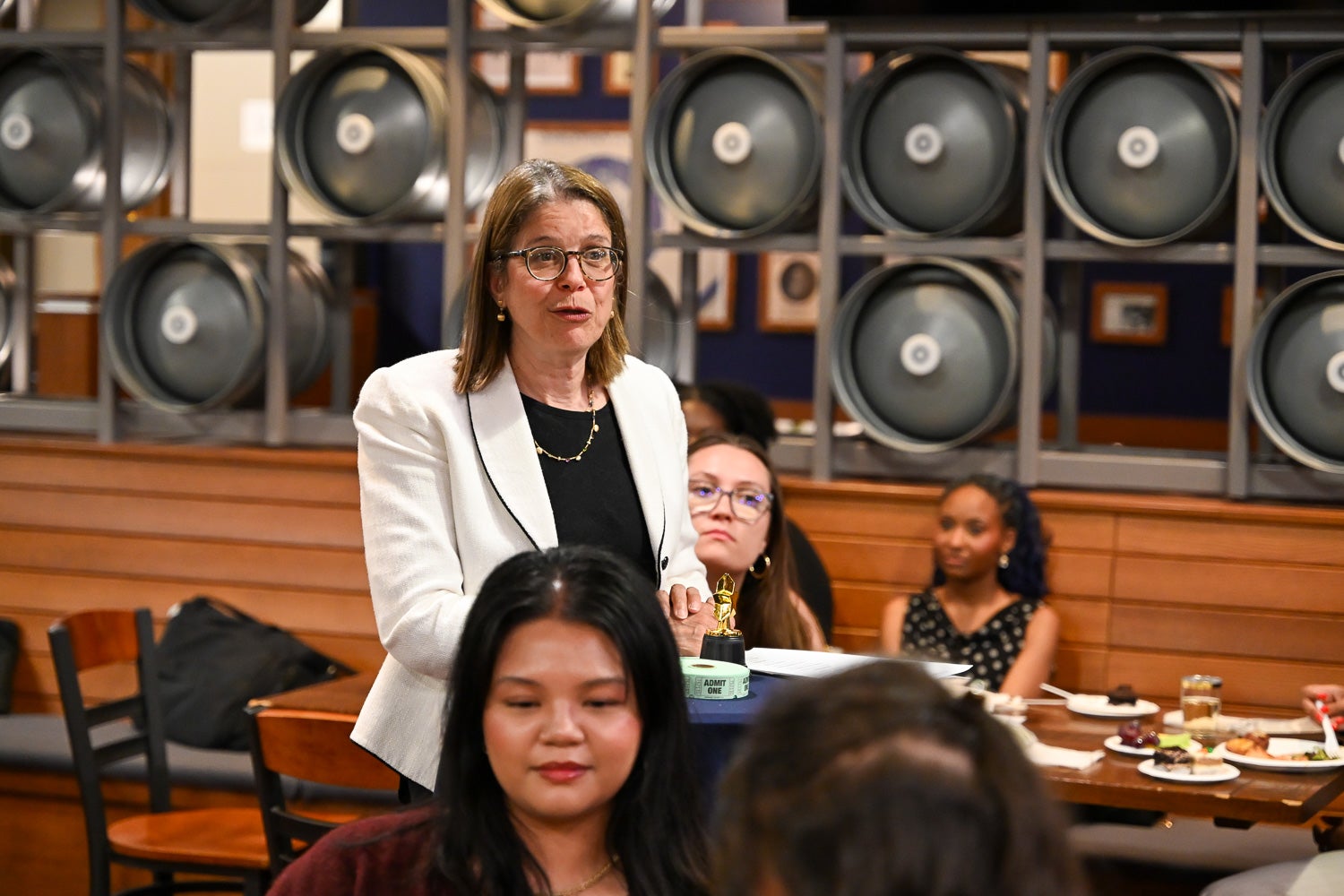 Hakima Amri speaks at the Integrative Medicine & Health Sciences Pre-Commencement Dinner