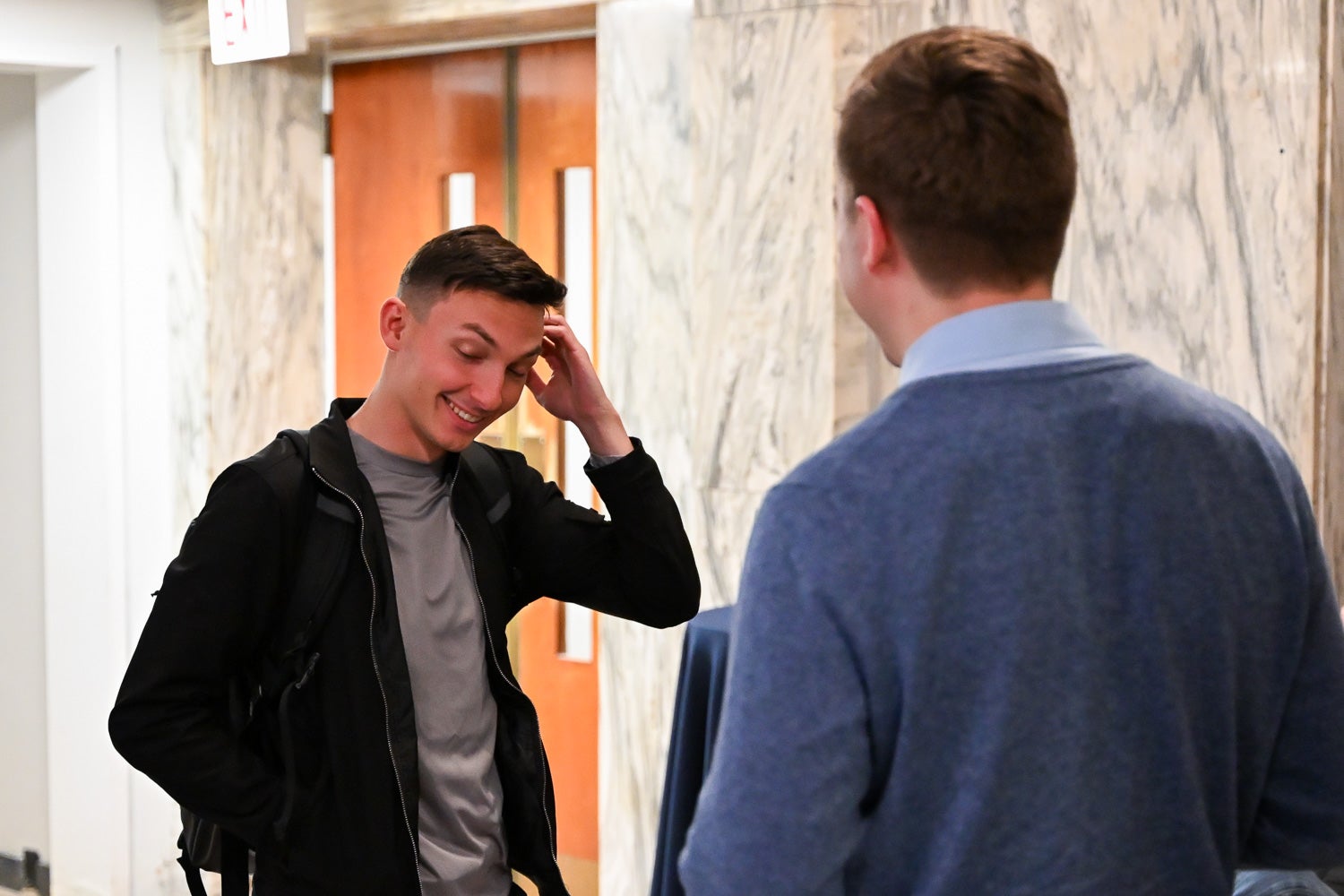 Students talk at the Department of Microbiology & Immunology Reception