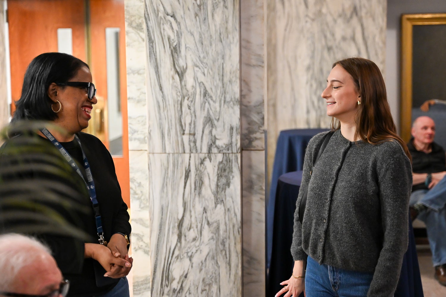 A student receives an award at Pharmacology & Physiology Poster Day