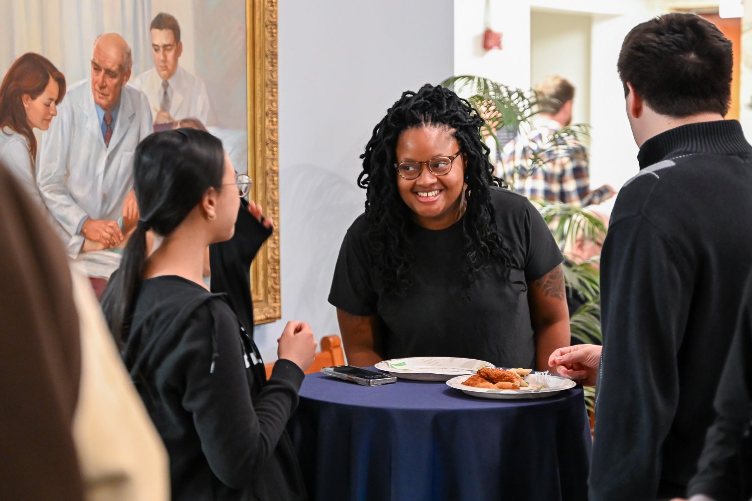 Attendees talk at the Department of Microbiology & Immunology Reception