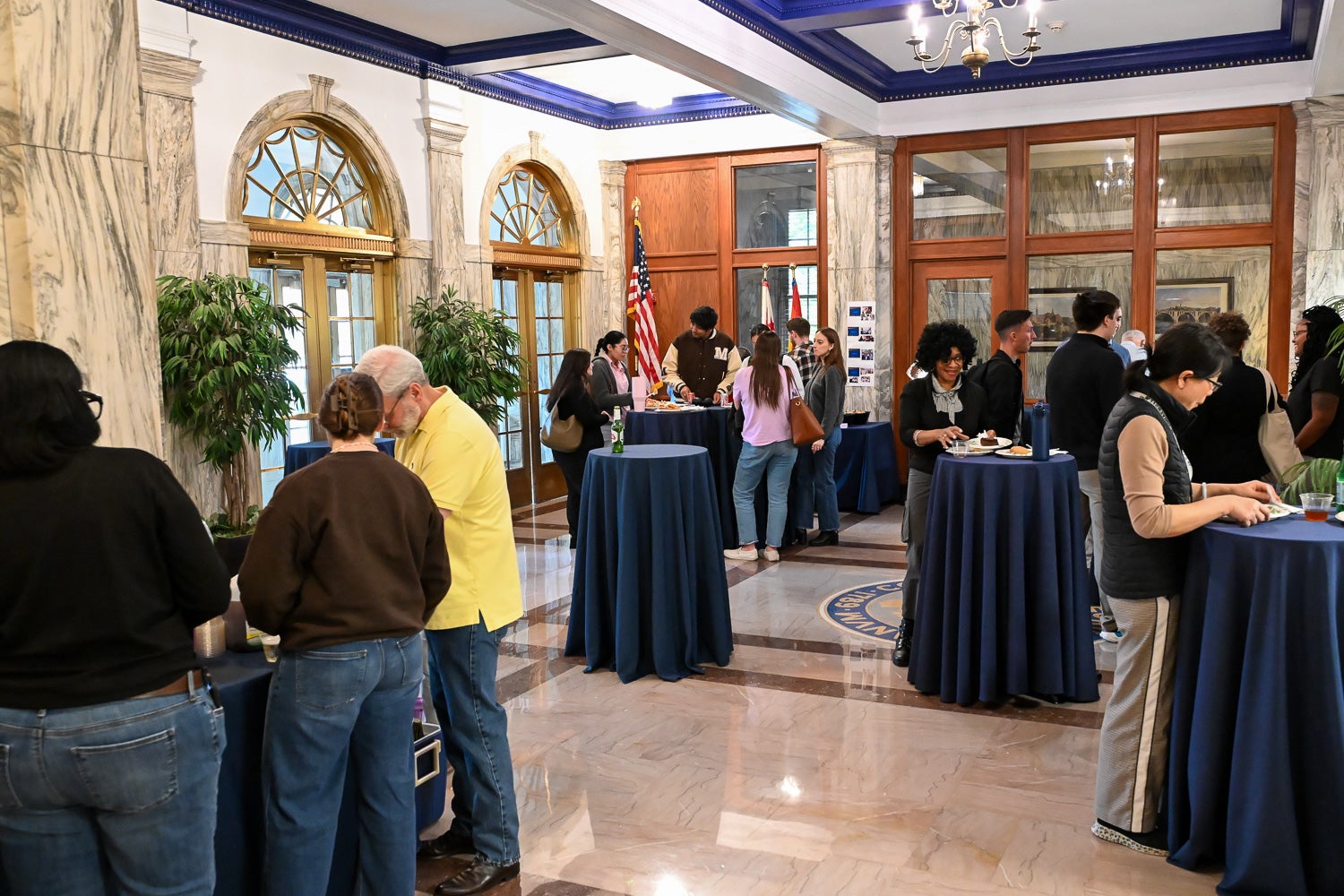 Attendees talk at the Department of Microbiology & Immunology Reception