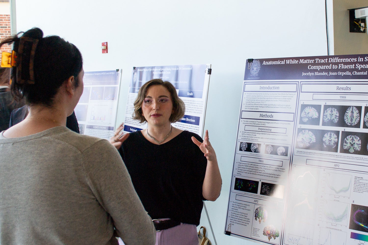 A student presents a research poster at Neuroscience Student Research Day