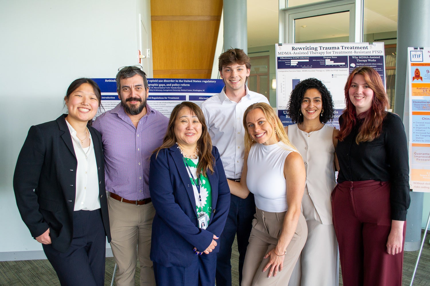 Students and faculty of the Integrative Neuroscience: Biomedical Science Policy & Advocacy concentration pose together at Neuroscience Student Research Day