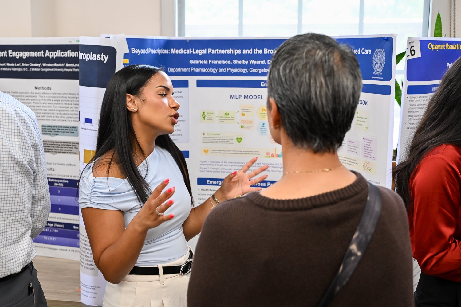 A student presents research at Pharmacology & Physiology Poster Day