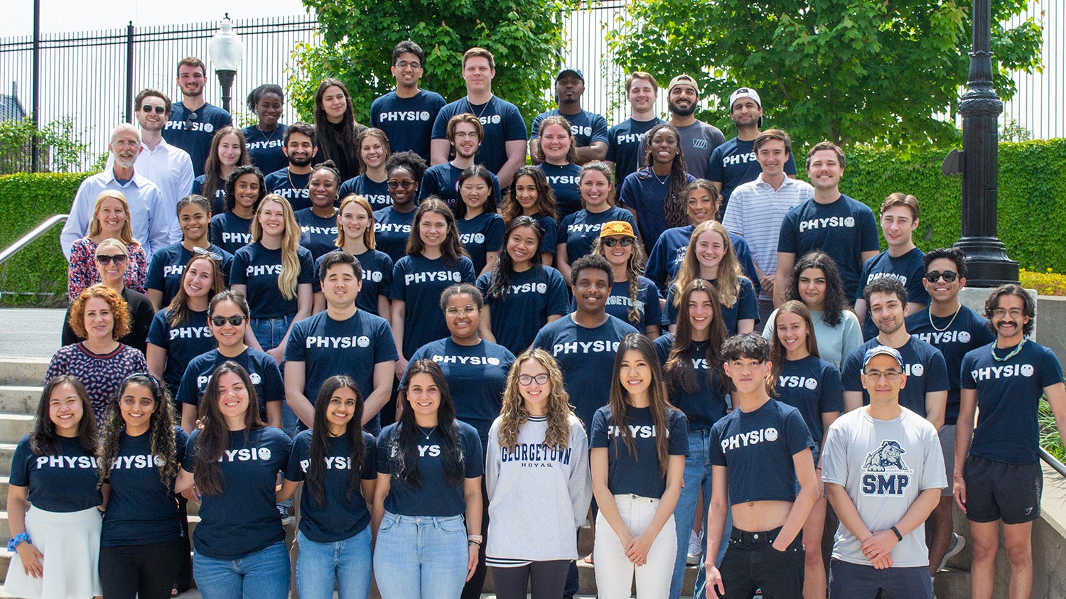 SMP students and faculty pose together in 2023.