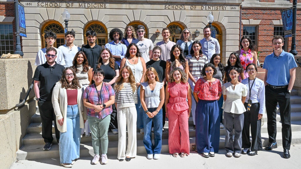 Members of the M.S. in Integrative Neuroscience program outside of the Medical and Dental Building at Fall 2026 orientation