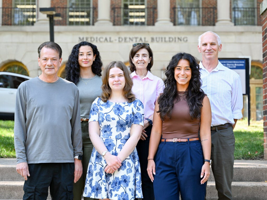 Members of the Ph.D. in Microbiology & Immunology program on the Med-Dent Steps at Fall 2026 orientation